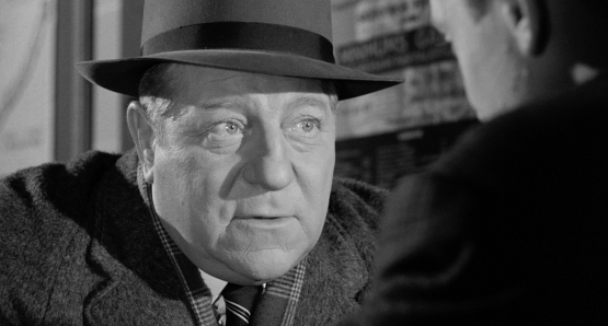 Jean Gabin as Inspector Jules Maigret in MAIGRET AND THE ST. FIACRE CASE.