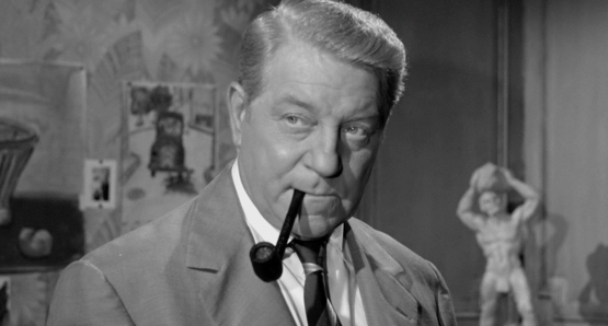 Jean Gabin as Inspector Jules Maigret in MAIGRET SETS A TRAP.