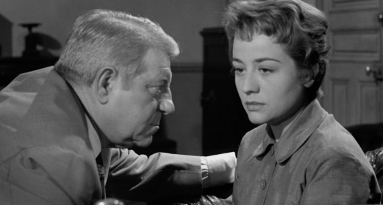 Jean Gabin and Annie Girardot in MAIGRET SETS A TRAP.