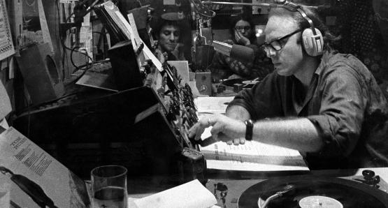 Bob Fass (front), subject of Paul Lovelace & Jessica Wolfson’s RADIO UNNAMEABLE (opening September 19 at Film Forum), in his WBAI studio with Abbie Hoffman. Photo by Robert Altman. A Kino Lorber release.