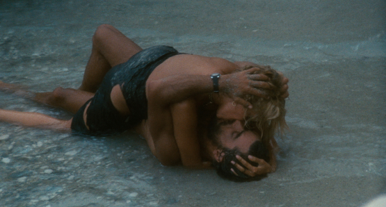 Giancarlo Giannini and Mariangela Melato in SWEPT AWAY.