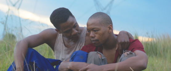 Nakhane Touré and Bongile Mantsai in <i>The Wound</i>, courtesy Kino Lorber