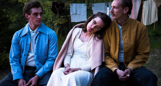 Lauri Tilkanen, Jessica Grabowsky, and Pekka Strang in a scene from <i>Tom of Finland</i>. Photo by Josef Persson, courtesy Kino Lorber.