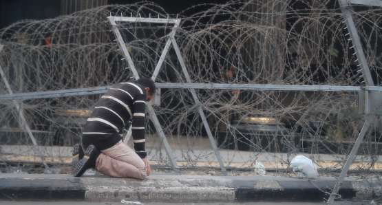 Barbed wire barricades in downtown Cairo in <i>Whose Country?</i>. Courtesy of Kino Lorber.