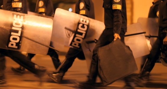 Police on the streets of Cairo in<i>Whose Country?</i>. Courtesy of Kino Lorber.